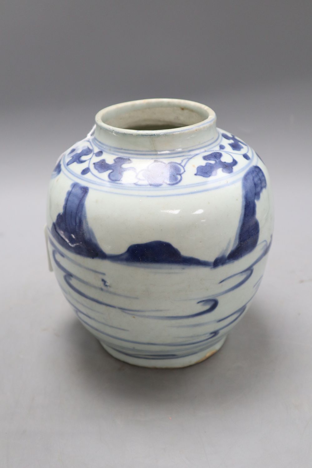 A Chinese Late Ming blue and white landscape jar, height 19cm, with certificate of authenticity, restored rim